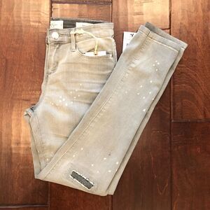 Grey stretchy distressed skinny jeans